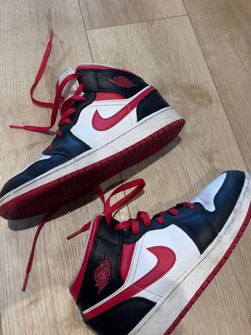 Nike Black White Red Air Jordan 1 Mid Sneakers